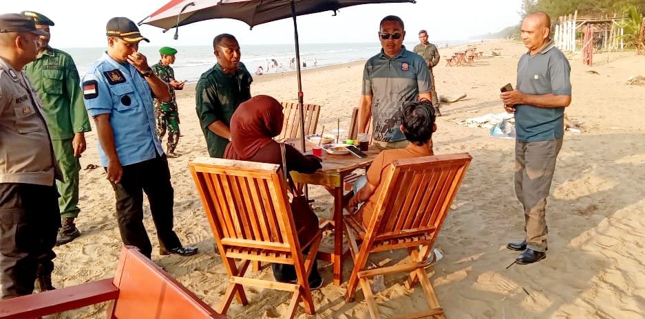 Satpol PP dan WH Aceh Utara Patroli di Pantai Bantayan, Cegah Pelanggaran Syariat